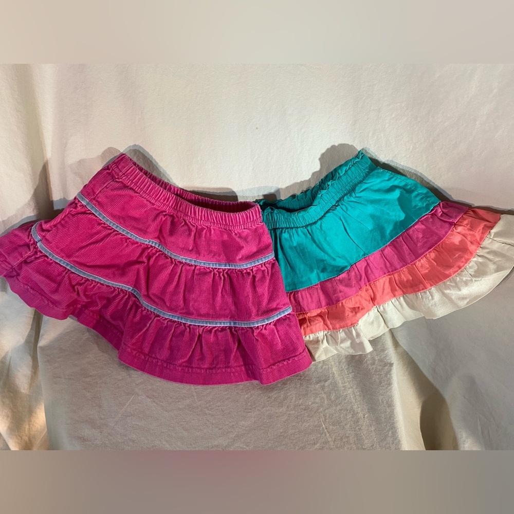 A pair of fun, brightly colored skirts